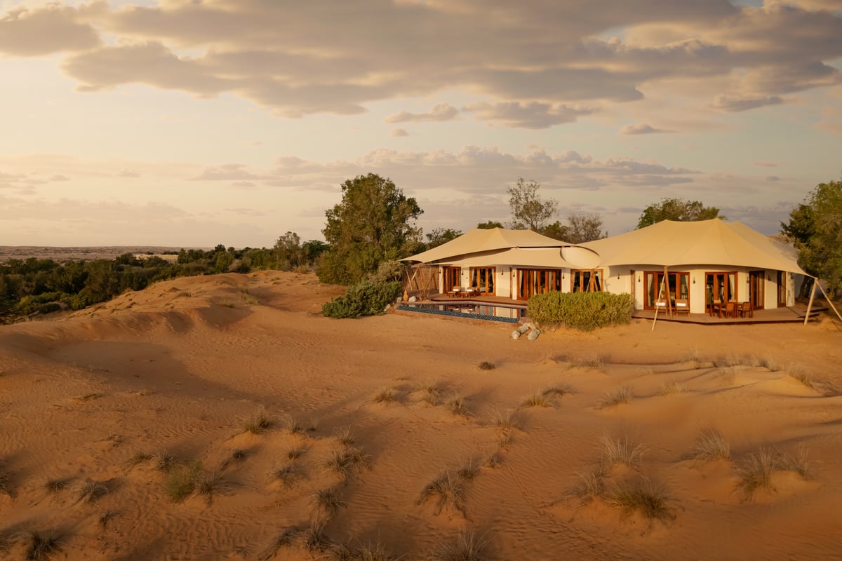Emirates Villa, twin tented pavilions with a private pool sitting behind a sand dune, at Al Maha Desert Resort.