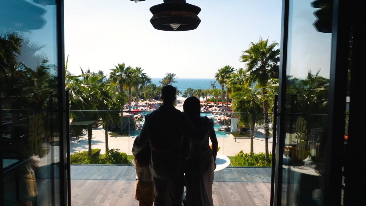 A resort film of Banyan Tree Dubai: the entrance, pool from above, suites, dining, a terrace hot tub and aerial views with Ain Dubai.